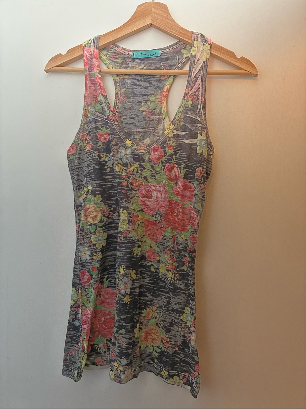 happening in the present Gray Floral Racerback Tank with Pink & Green Accents